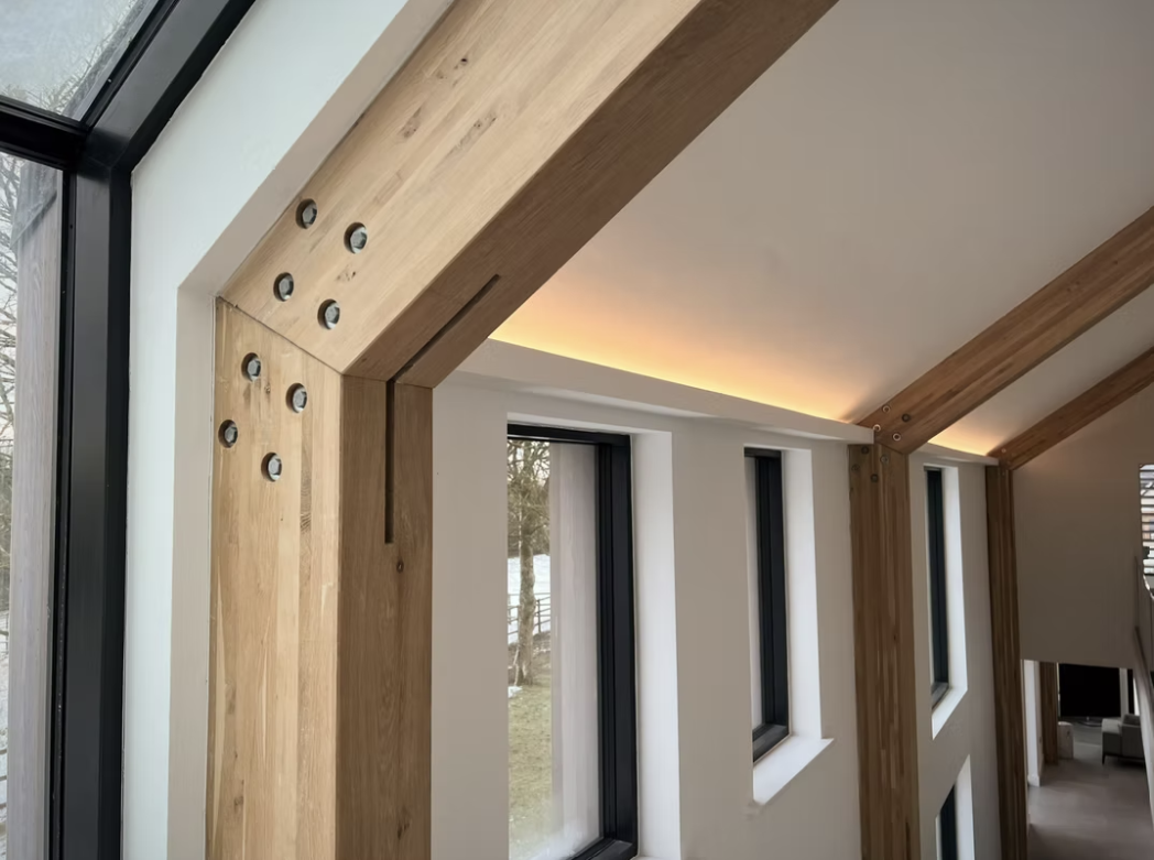 Interior work with oak beams by Braymont Construction